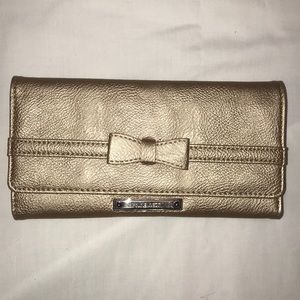Nine West gold wallet with bow